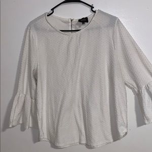 A white polka dotted shirt